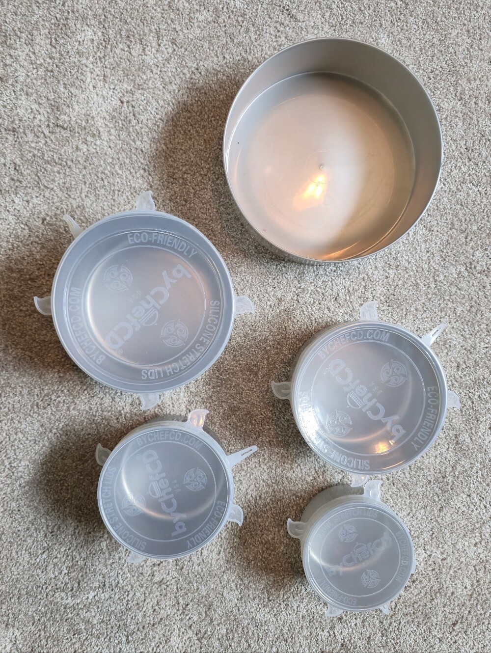 Tupperware nesting bowls or camping pots w/ clear silicone stretch Lids